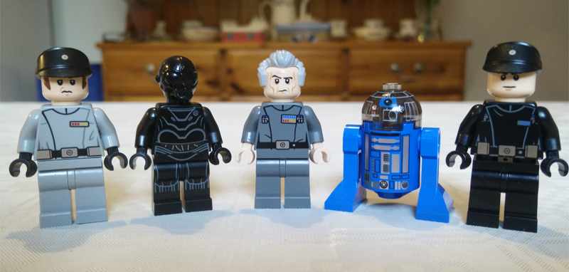 I swear that’s Grand Moff Tarkin in the middle, not a very confused Lego Twelfth Doctor.